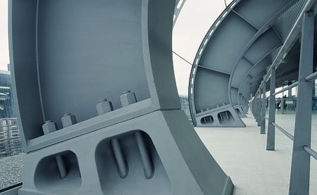 Carbon steel tubing in a infrastructural architectural application