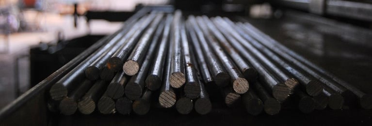 Metal rods resting on a shelf